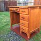 Vintage oak desk with 5 drawers and 1 pull.