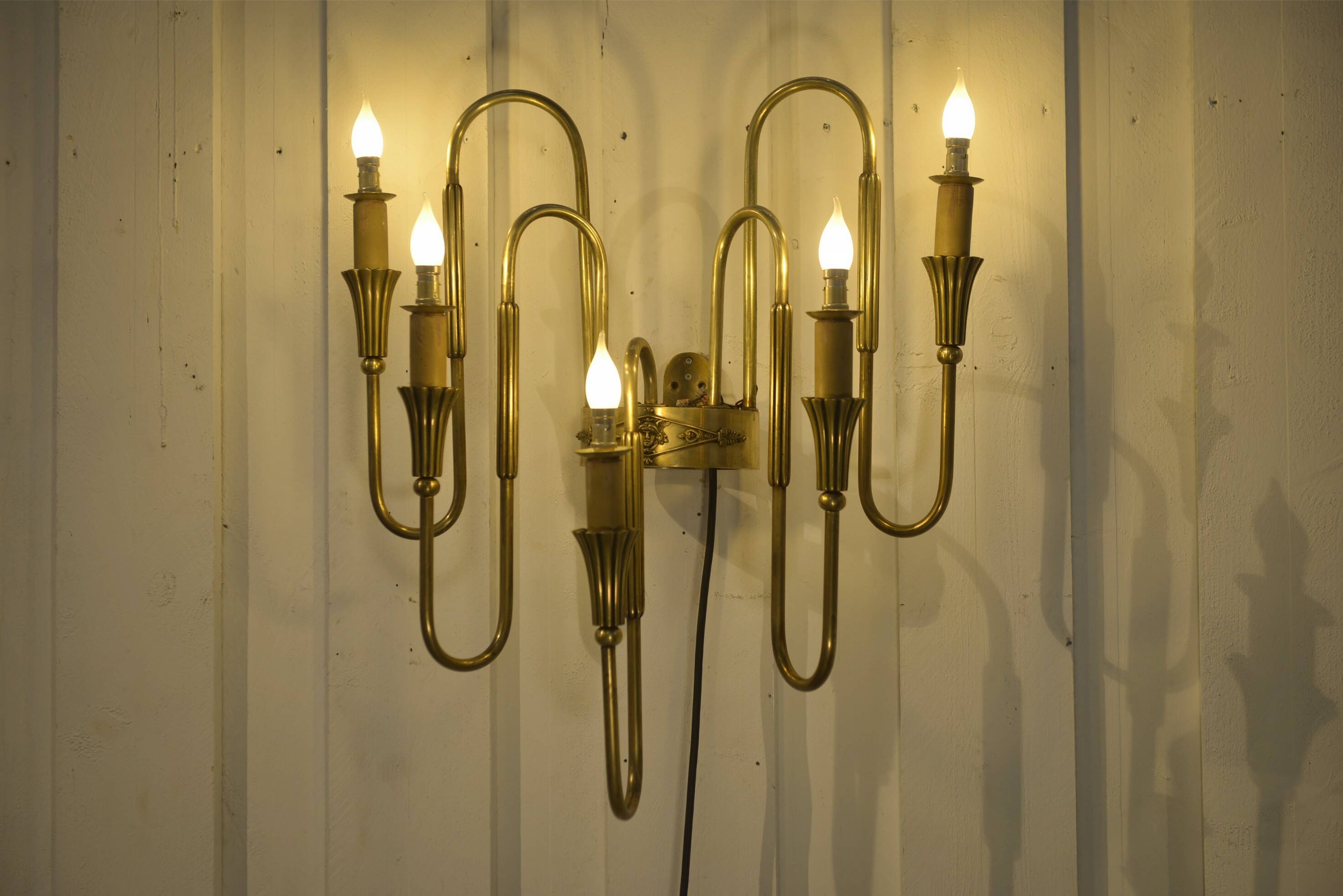 Monumental bronze wall light with 5 arms, neoclassical Art Deco from the 1940s.