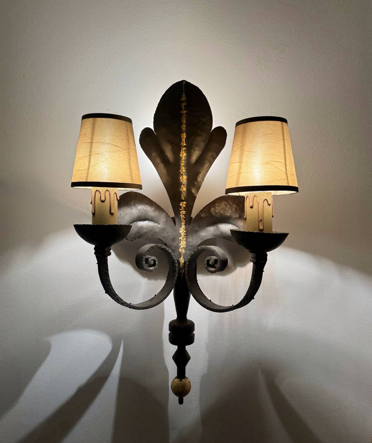 Large lily flower wrought iron wall light from the 1960s.