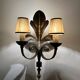 Large lily flower wrought iron wall light from the 1960s.