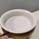 Small ceramic bowl with handle, in golden colours. Danish 1960-70s
