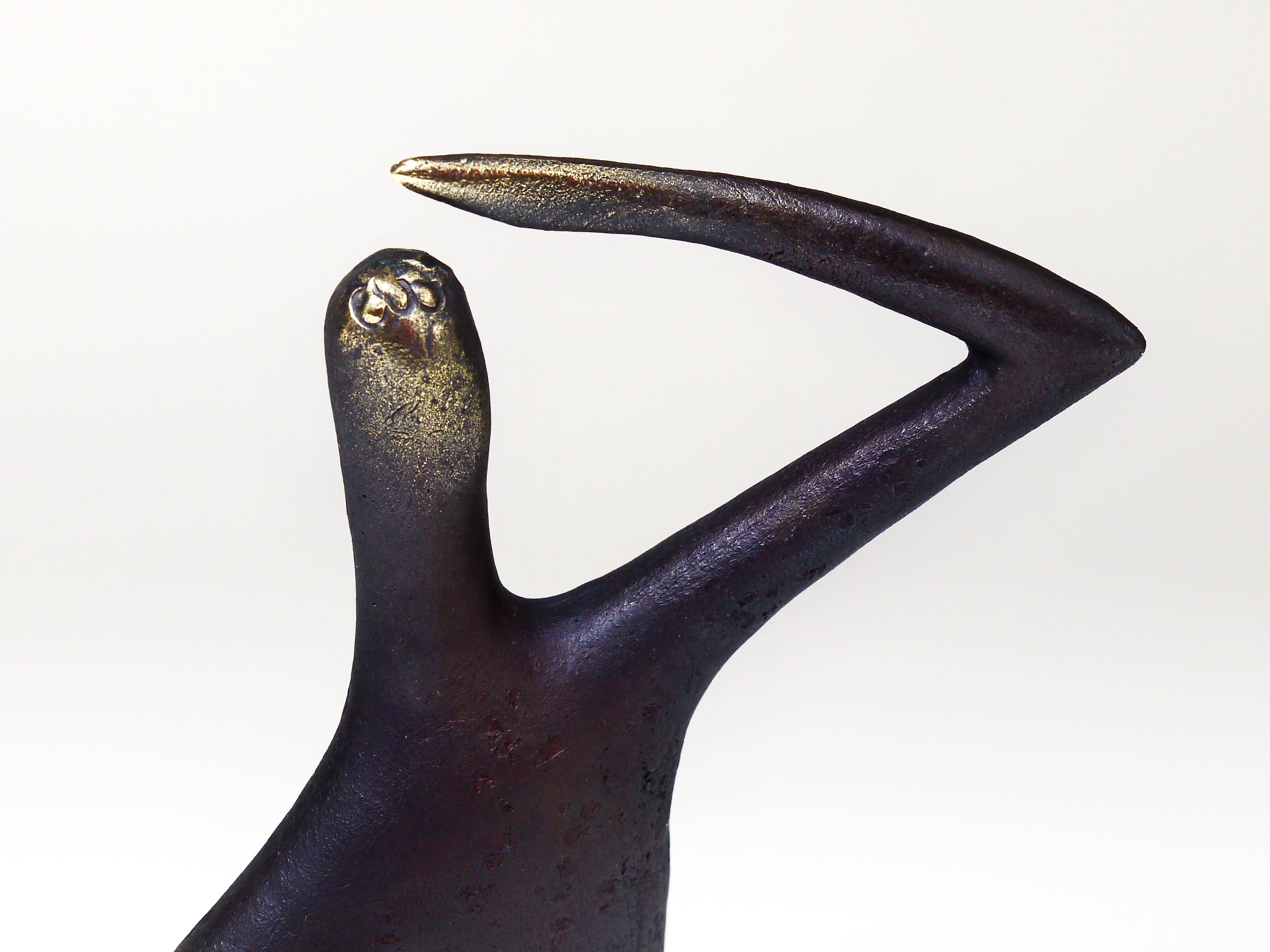 Handmade brass sculpture by Carl Auböck, Optimist Pessimist, model no. 4059.