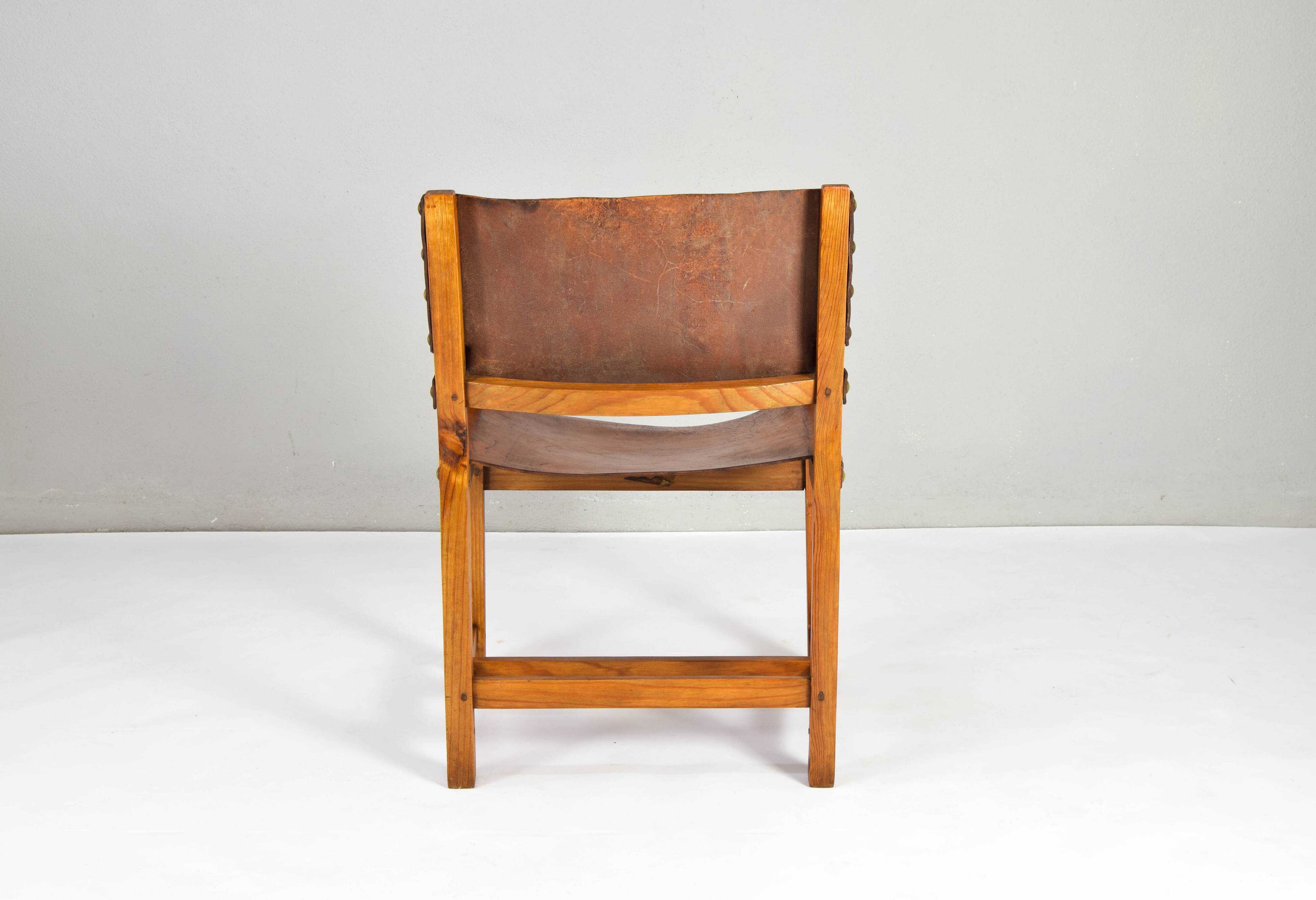 19th century oak and cognac leather brutalist castellana spanish armchair