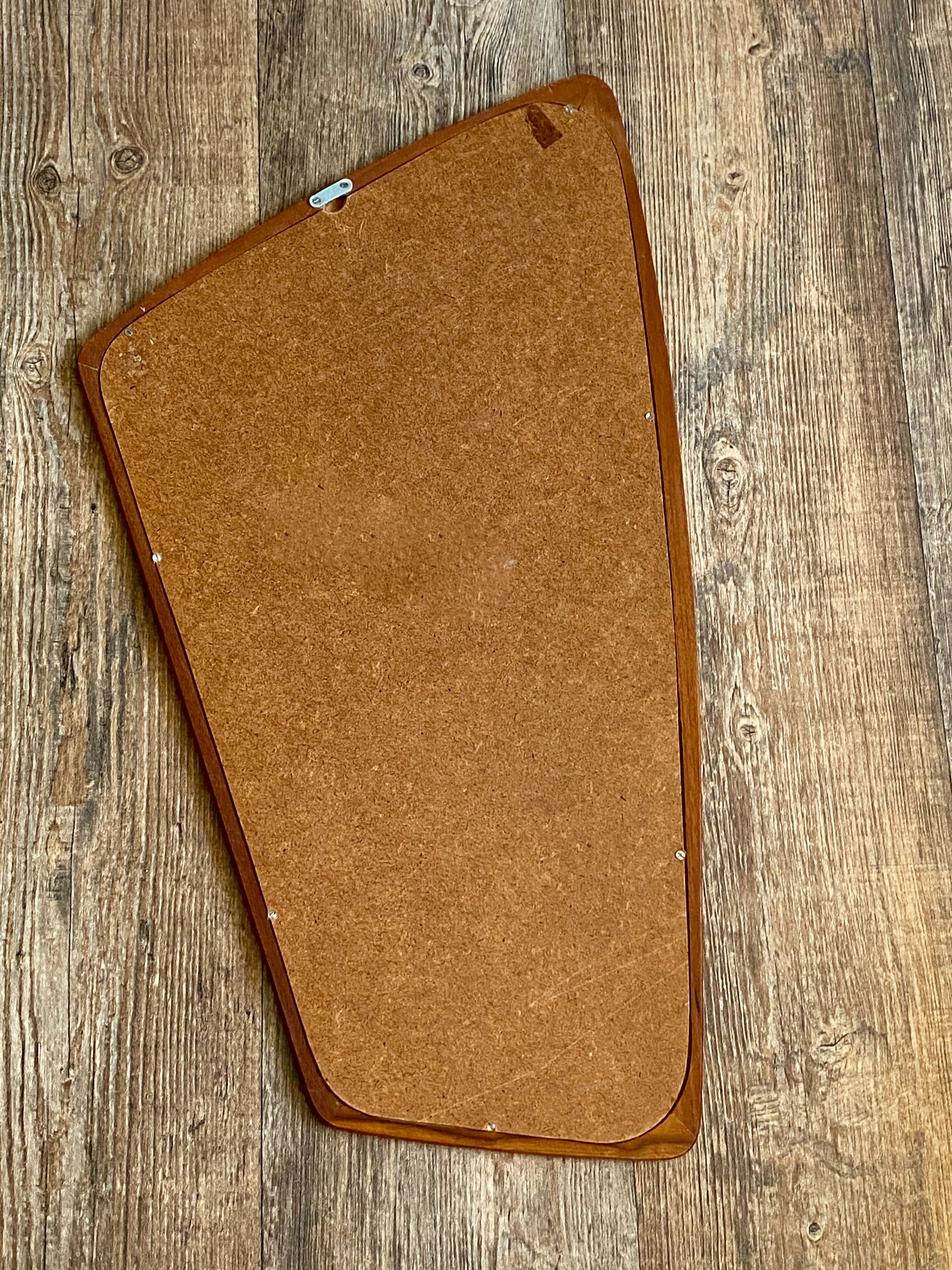 Free-form teak mirror - scandinavian work of the 1960s