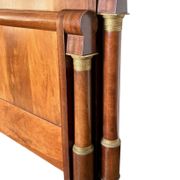 Empire-style mahogany bed