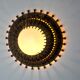 Midcentury brutalist sun wall lamp, metal and gold leaf, Italy