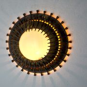 Midcentury brutalist sun wall lamp, metal and gold leaf, Italy