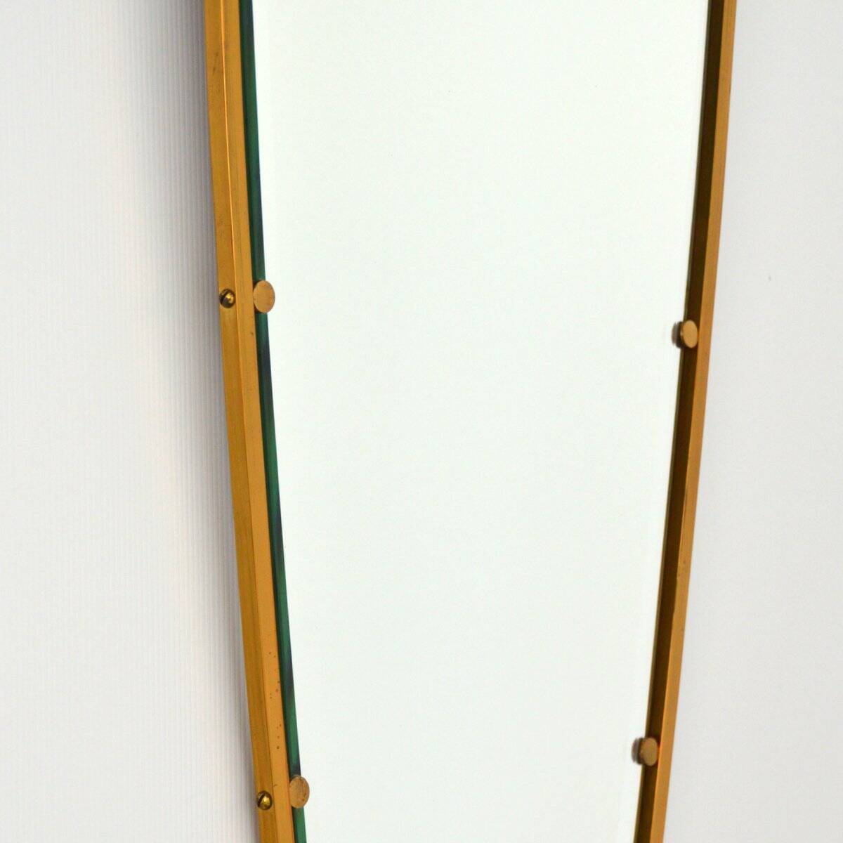 Superb free-form mirror in solid brass from the 50s/60s vintage.