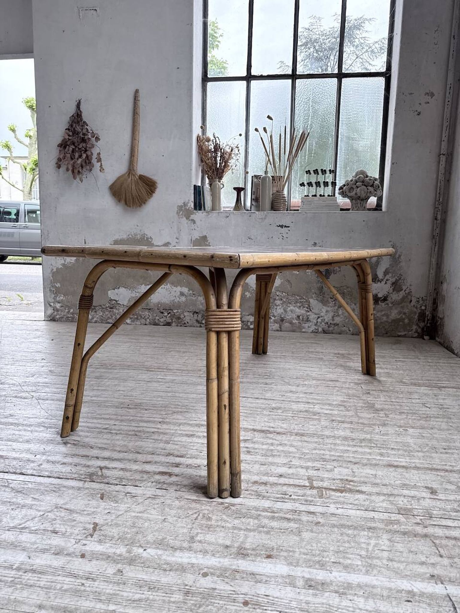 1950s rattan table with ceramic top