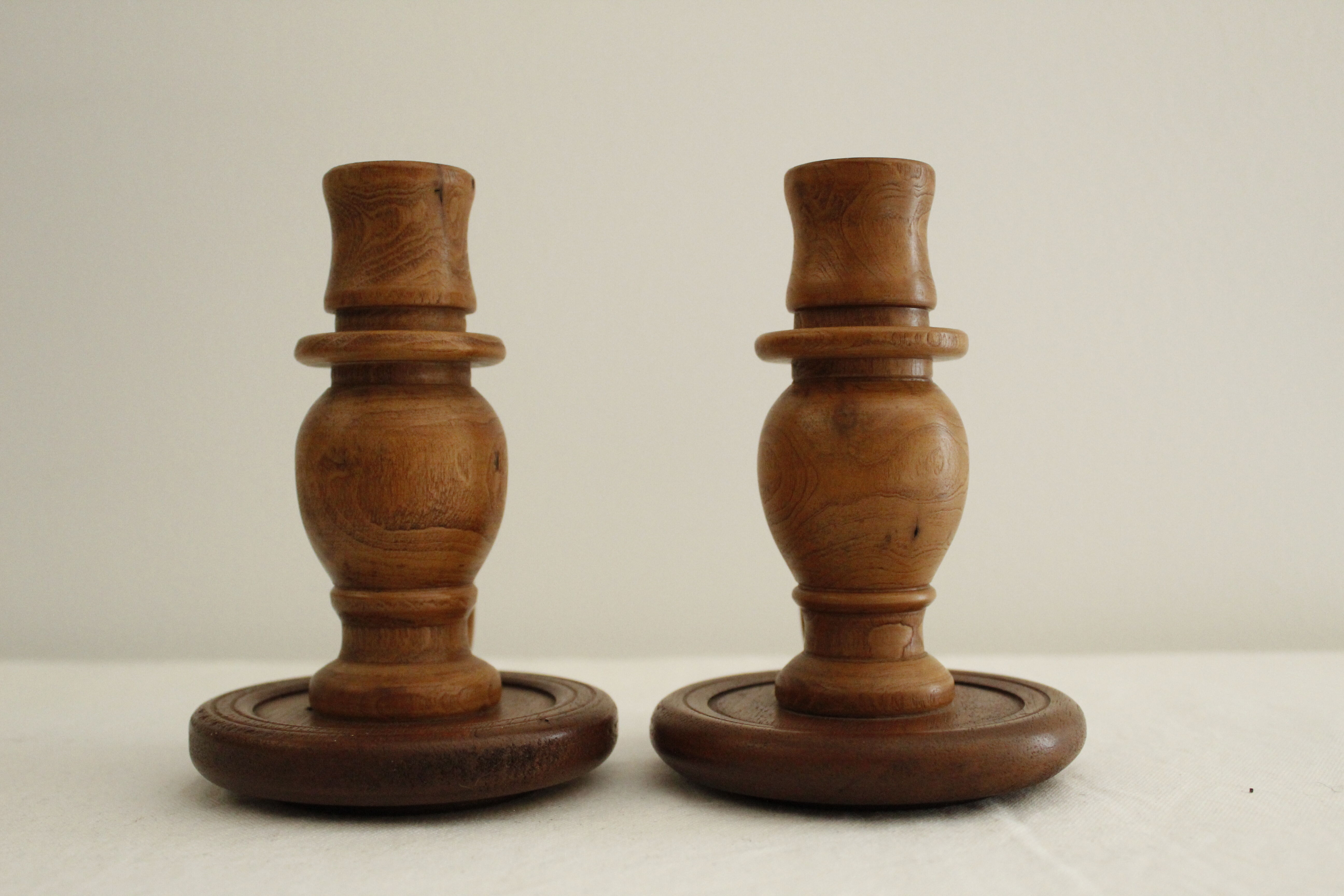 2 wooden candle holders