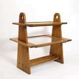 Served in oak and glass from the 50s and 60s.