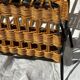 Vintage metal and wicker magazine rack