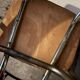 3 white Formica chairs
