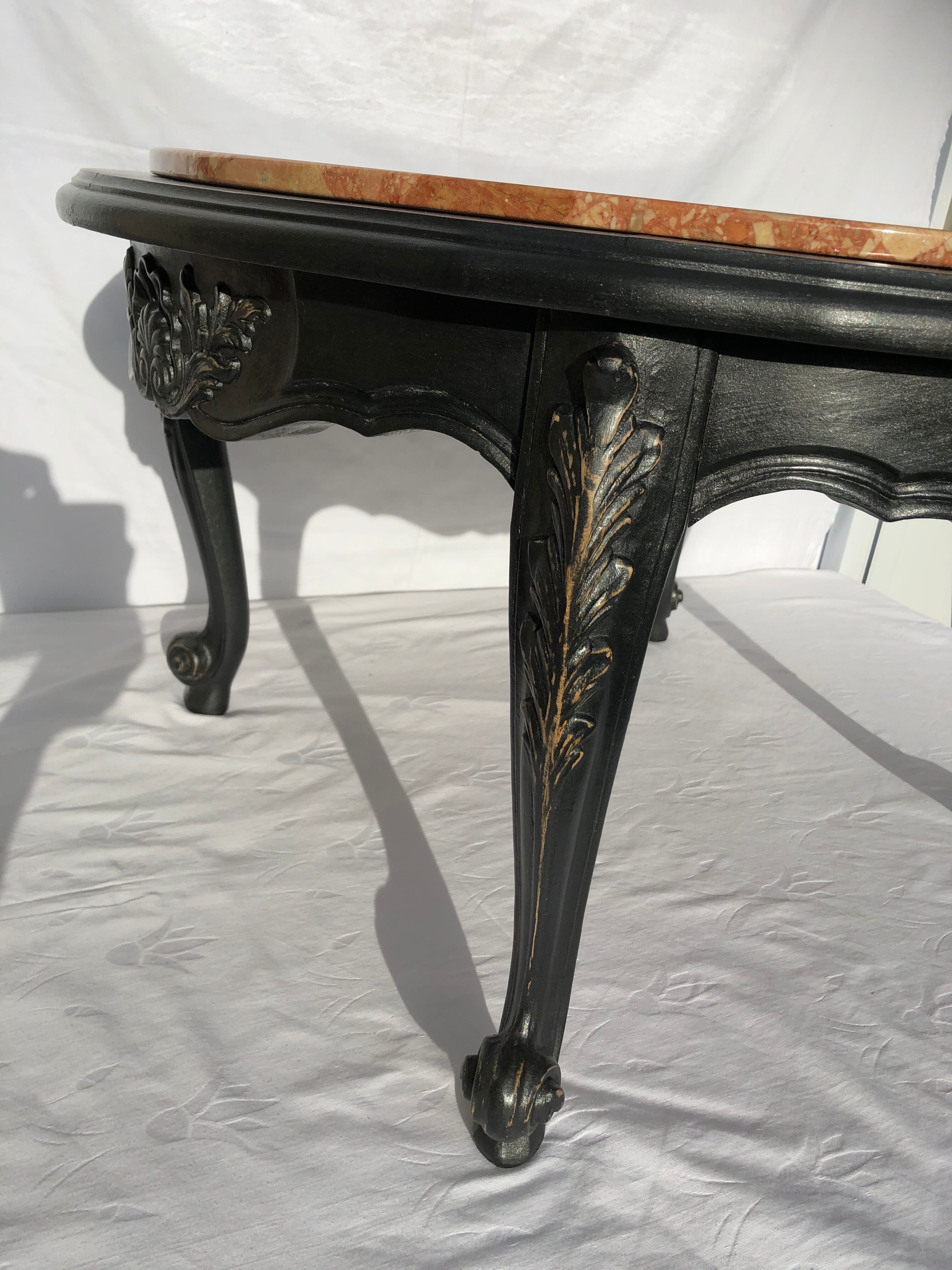 Coffee table with marble top breach