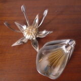 Individual ashtrays on decorative metal flower