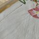 Antique linen tablecloth embroidered with flowers