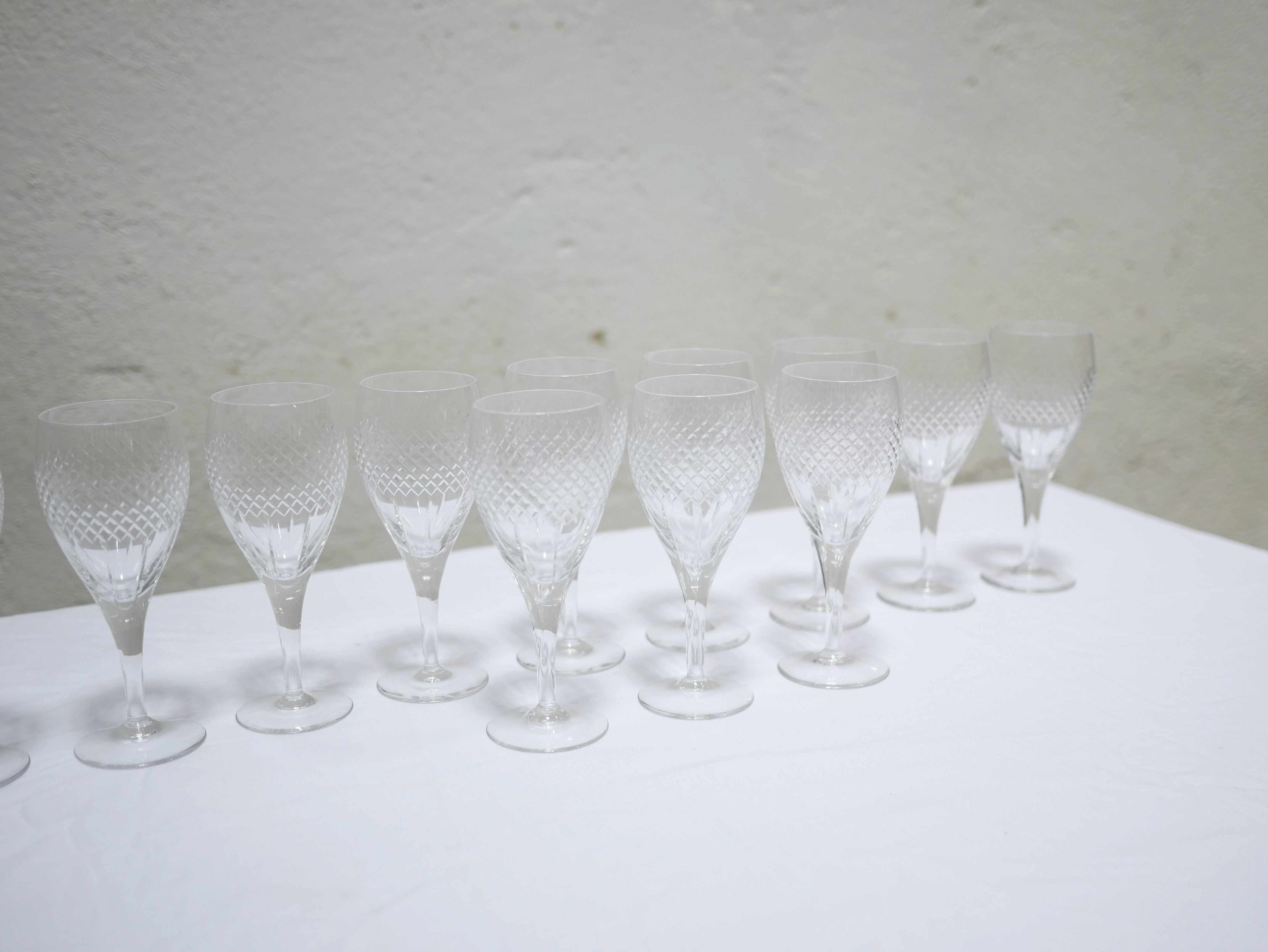 Series of 12 vintage red crystal wine glasses