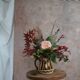 Amber glass and wicker carafe