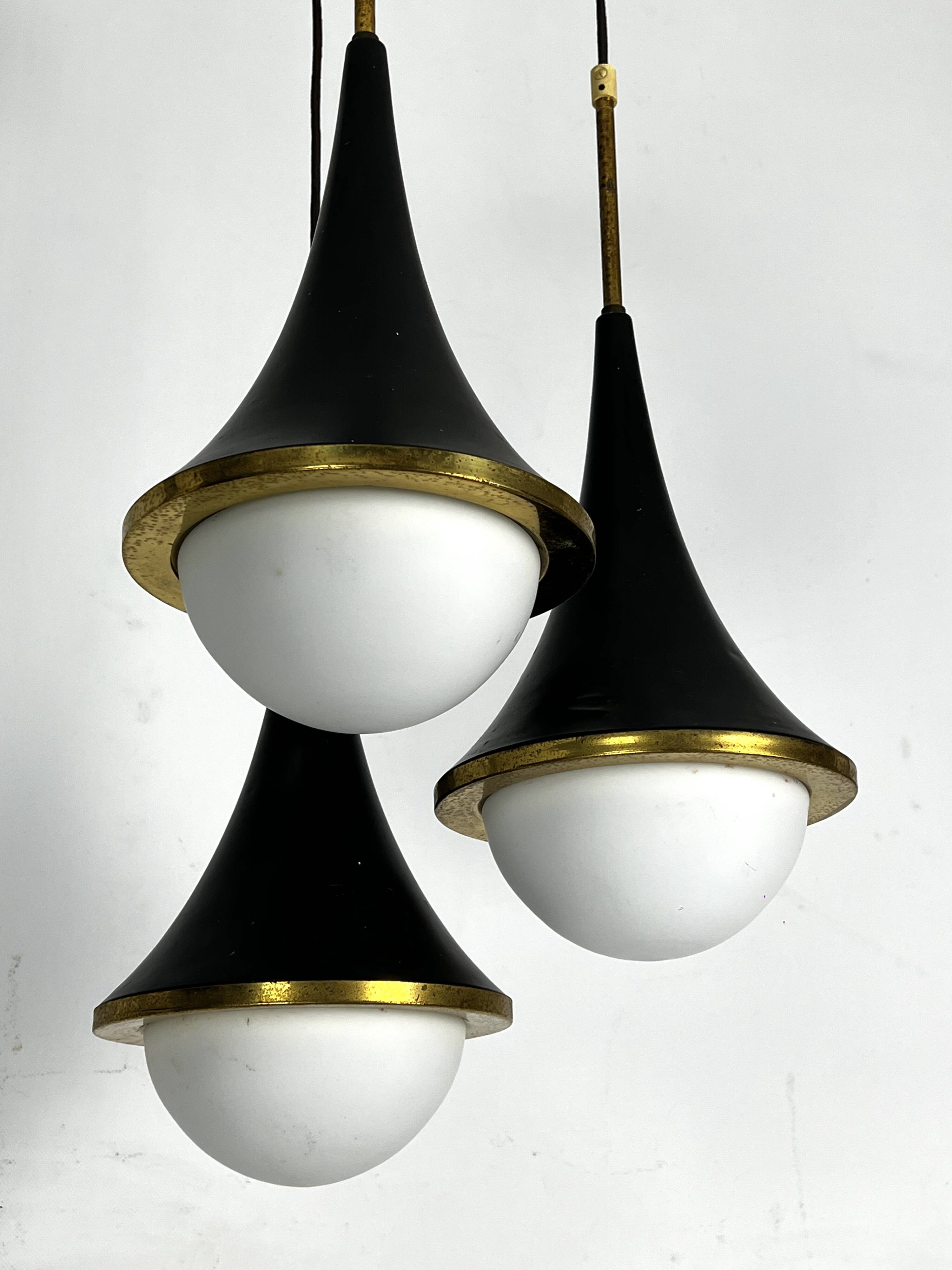 Mis-Century Stilnovo style pendant with three lights. Italy 1950s