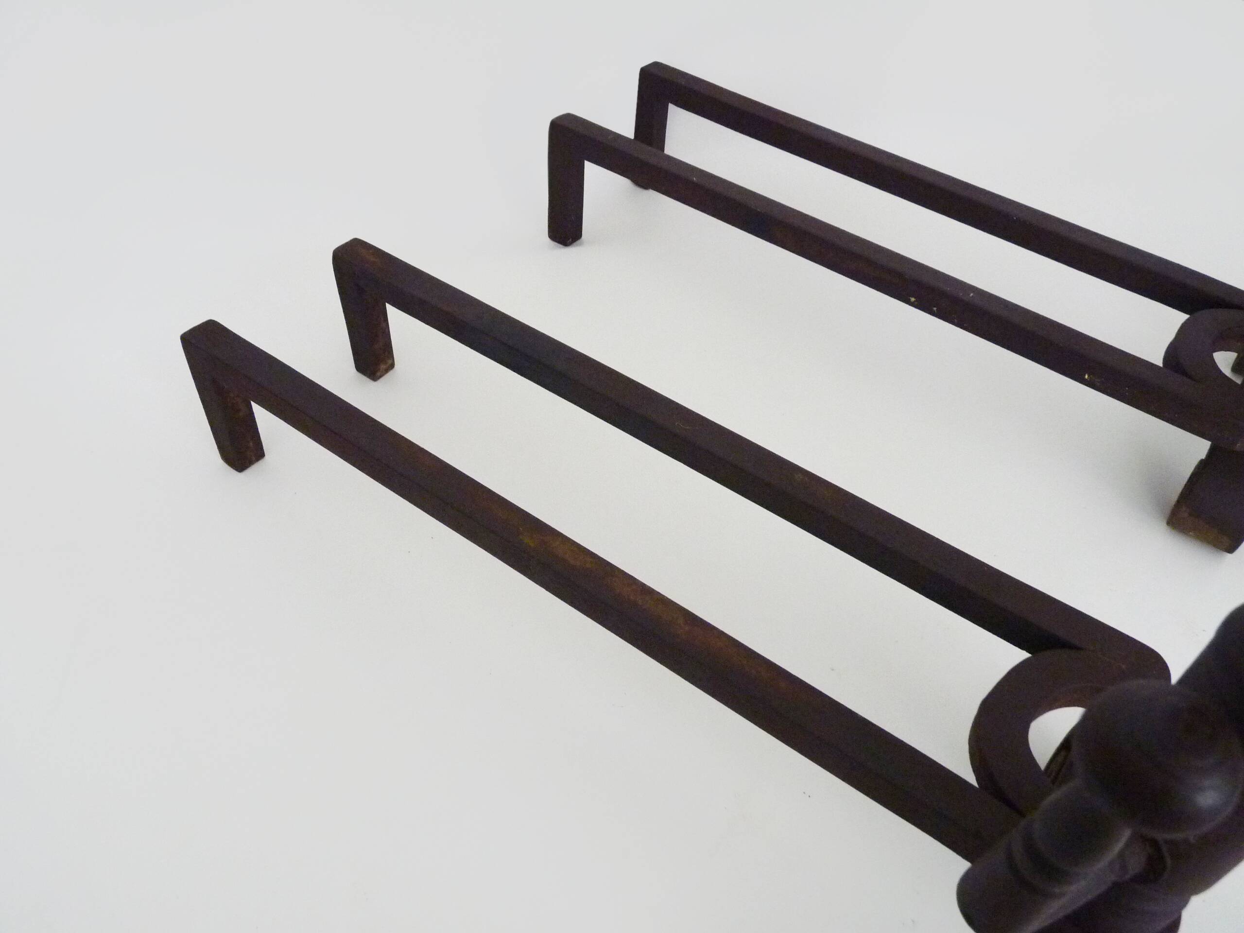 Large pair of wrought iron fireplace andirons. France, 19th century.