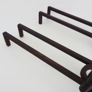 Large pair of wrought iron fireplace andirons. France, 19th century.