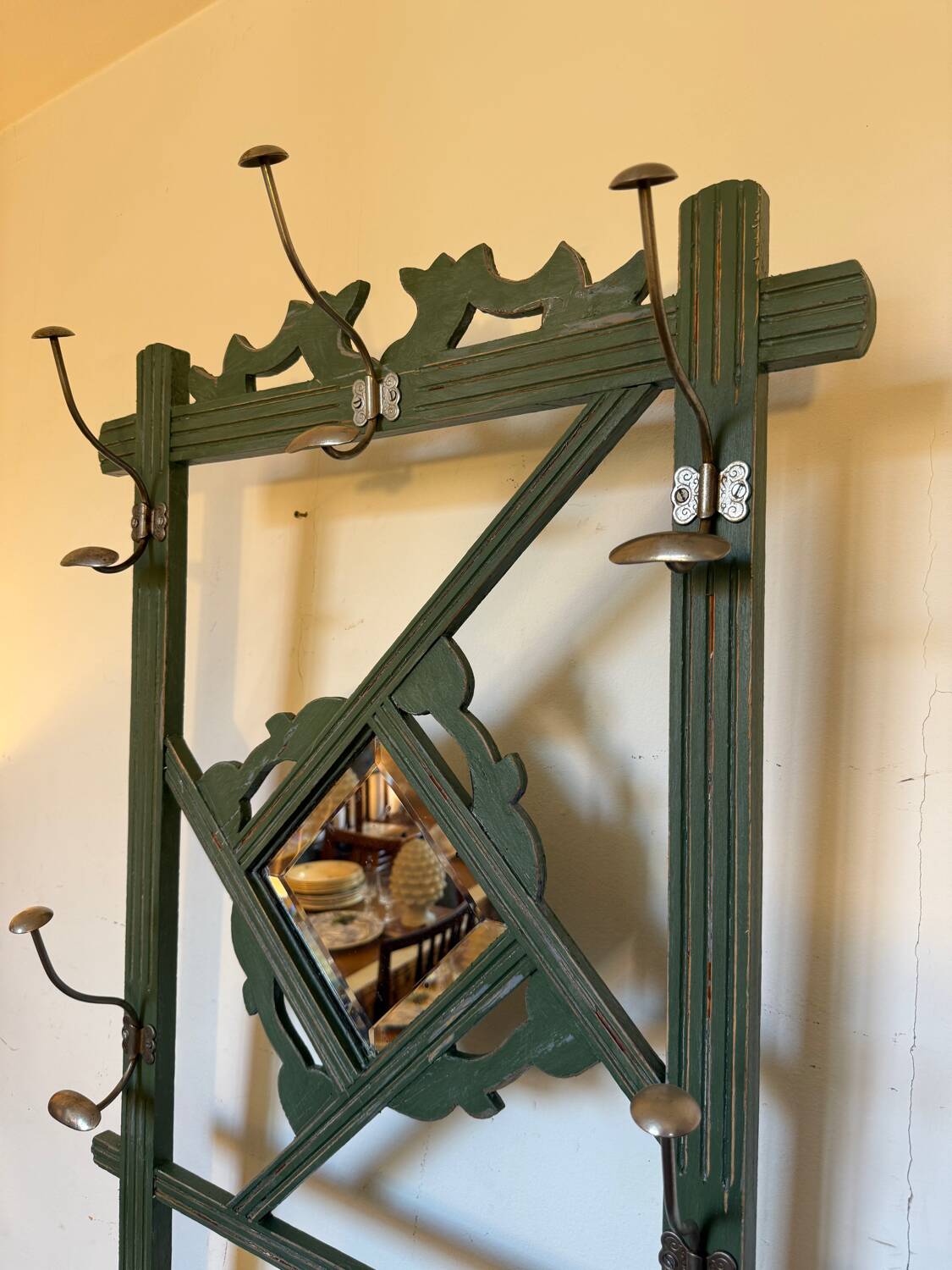 Art Deco coat rack in green patinated wood