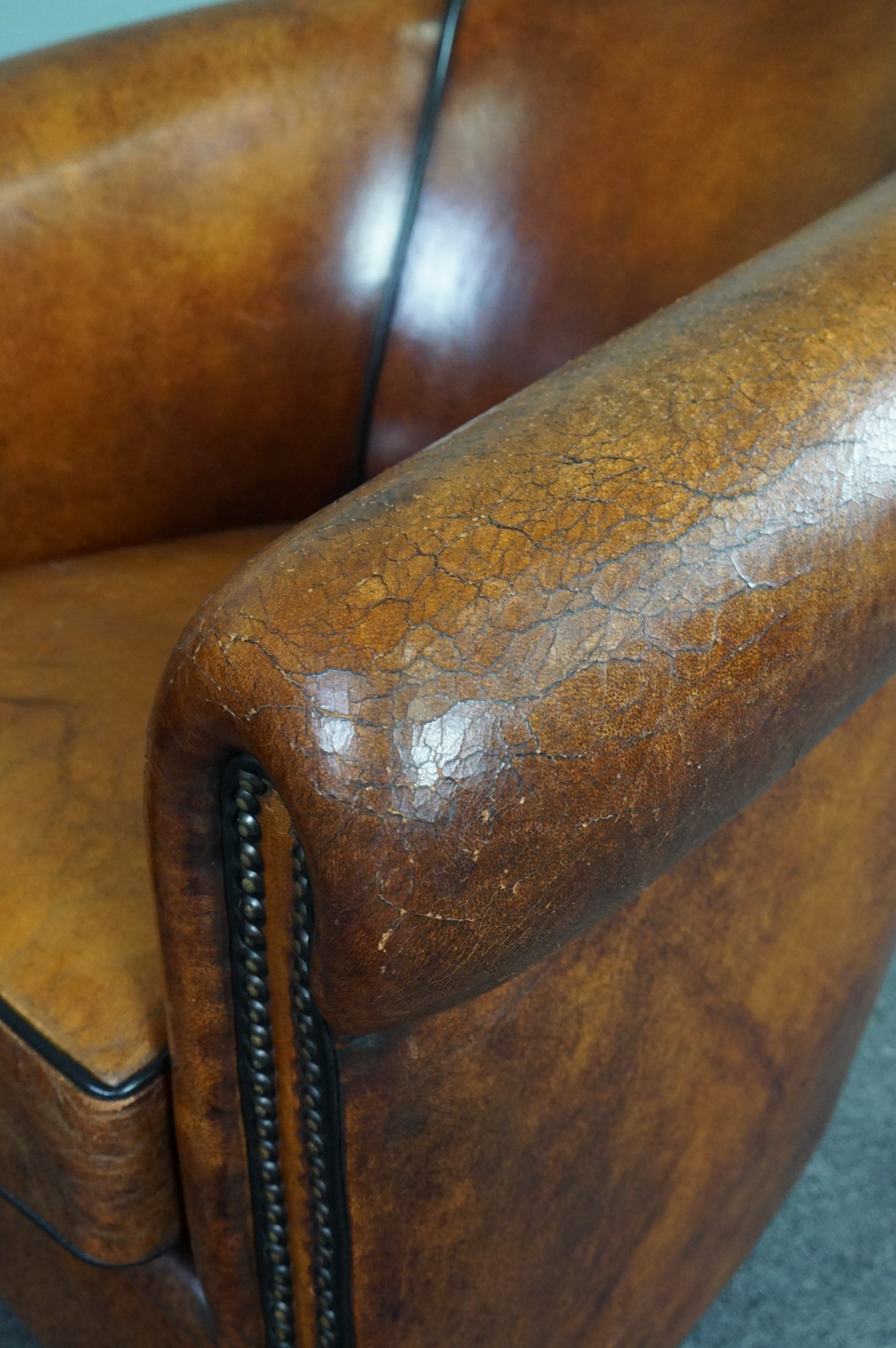 Set of 2 club chairs in black piping sheep leather