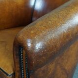 Set of 2 club chairs in black piping sheep leather