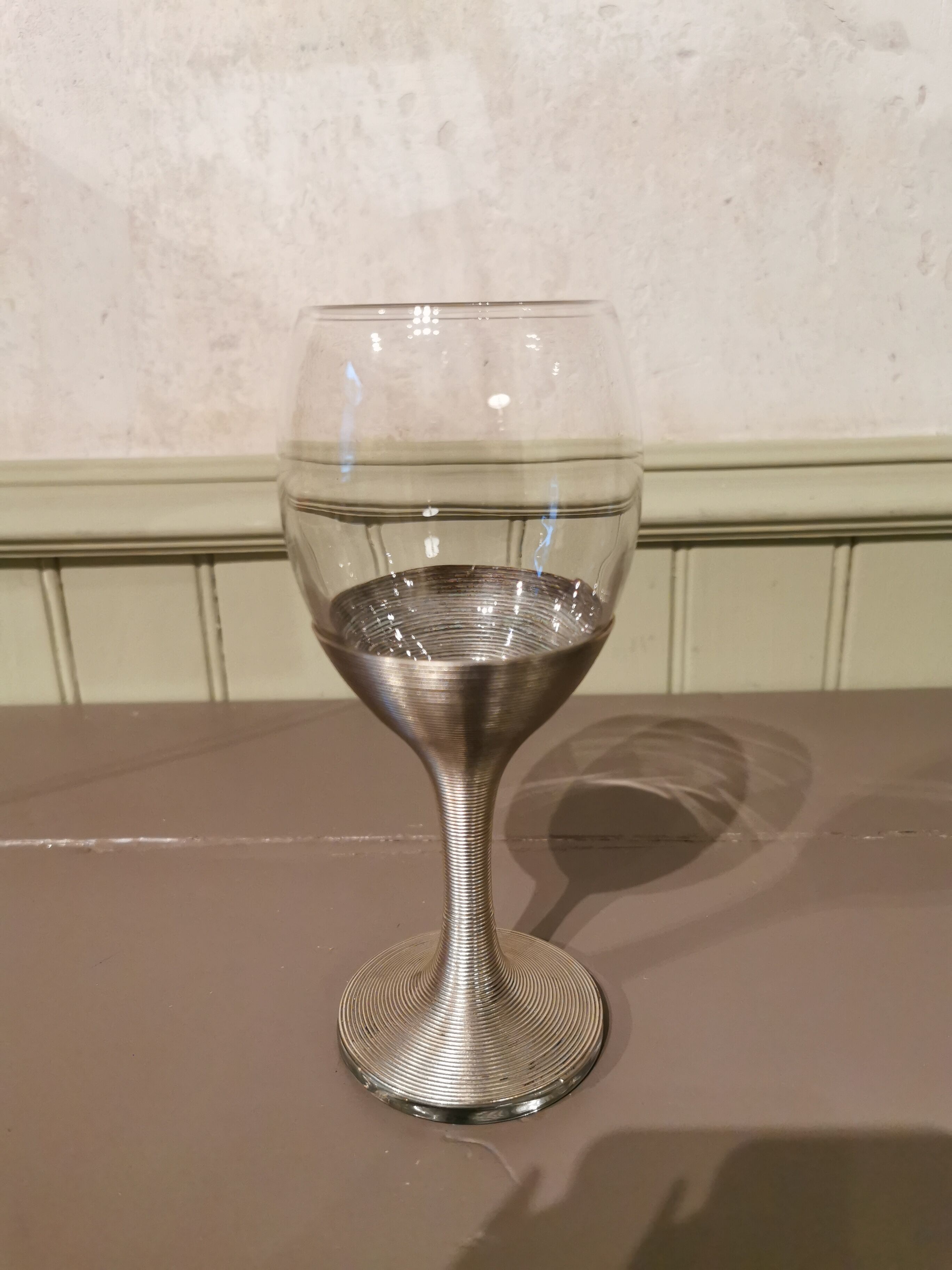 Suite de 7 verres à pied en Maillechort