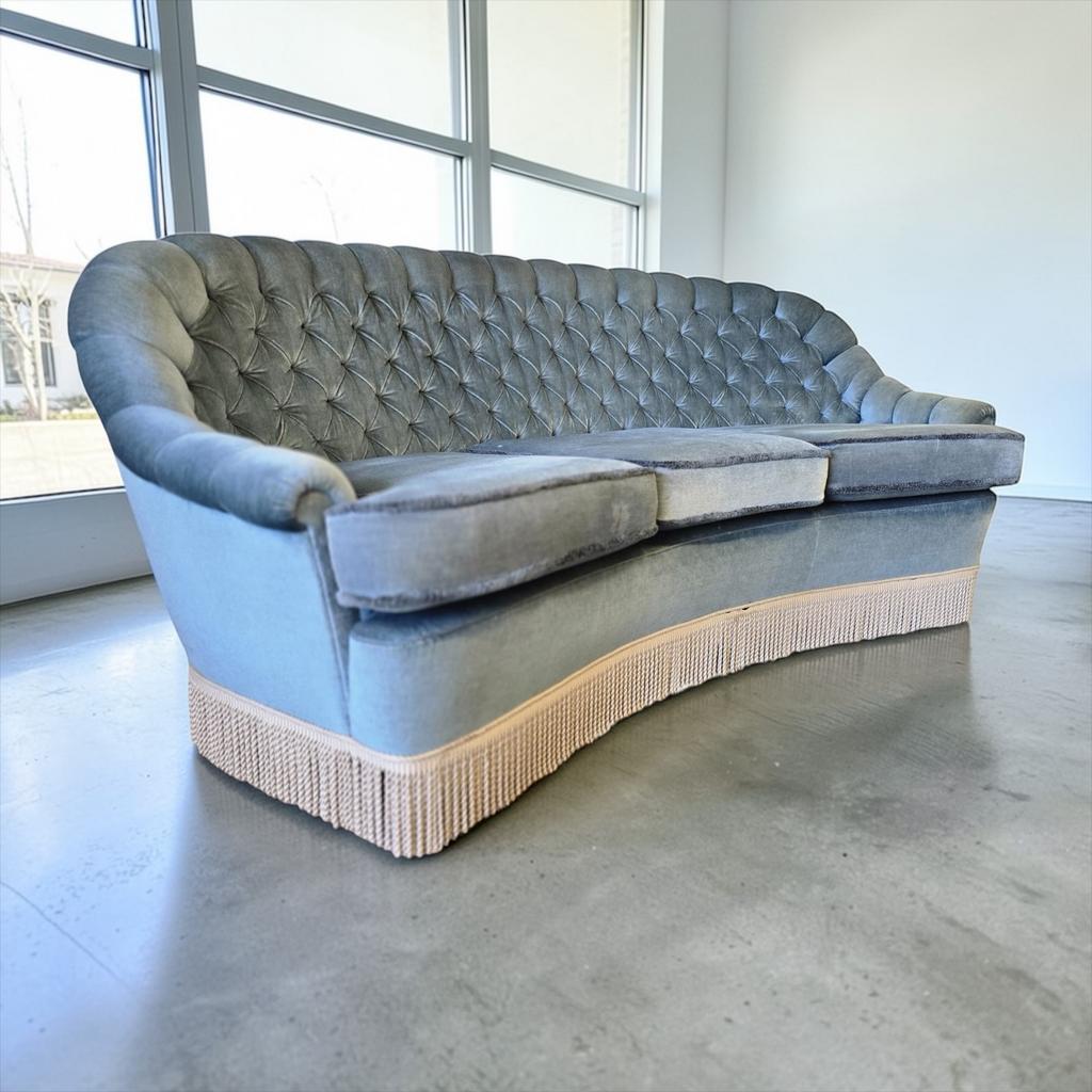 Light blue vintage sofa / armchair with fringes