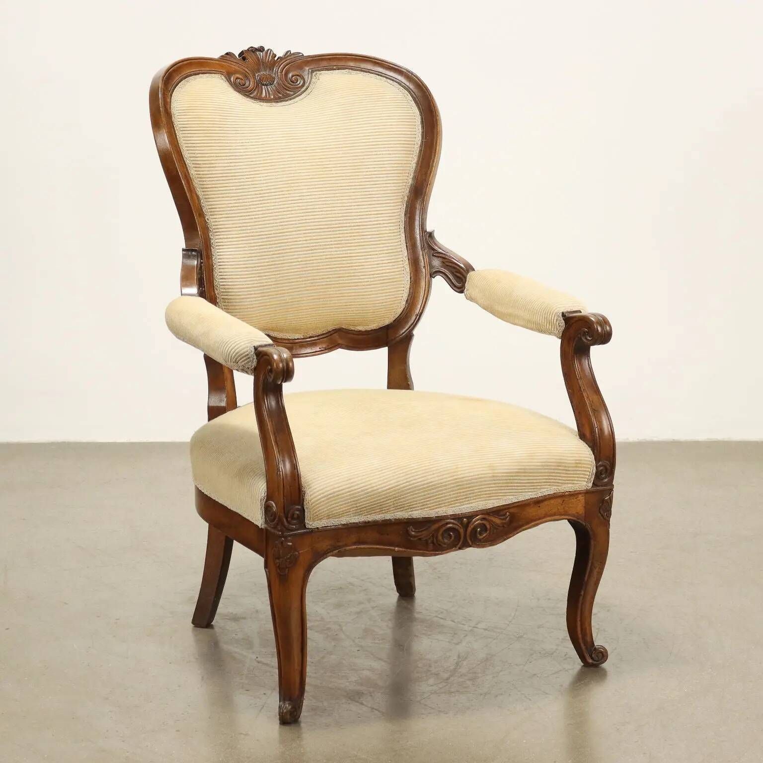 Antique Louis-Philippe armchair in carved walnut, Italy, 19th century