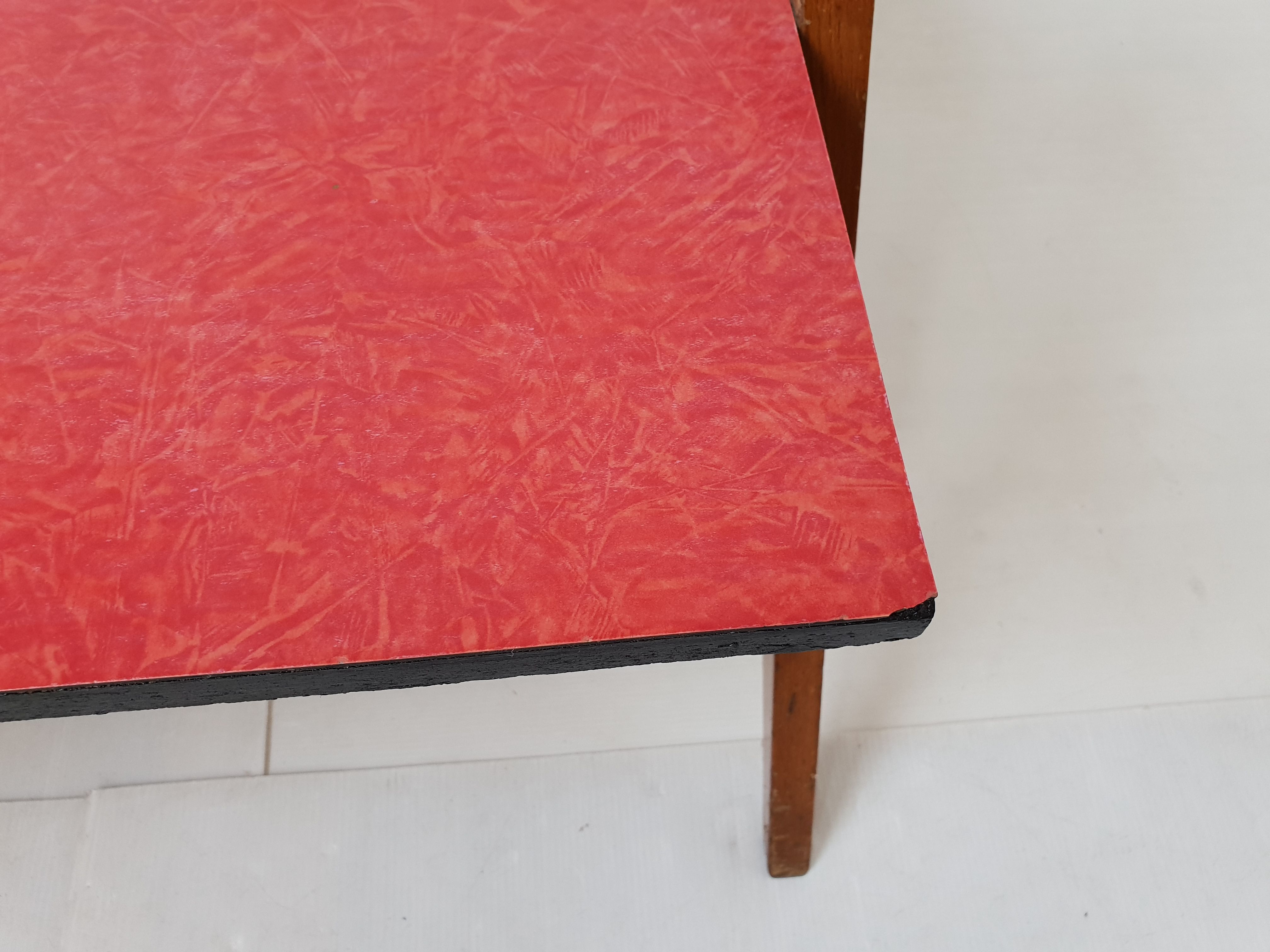 Coffee table in formica with compass feet, vintage from the 1950s
