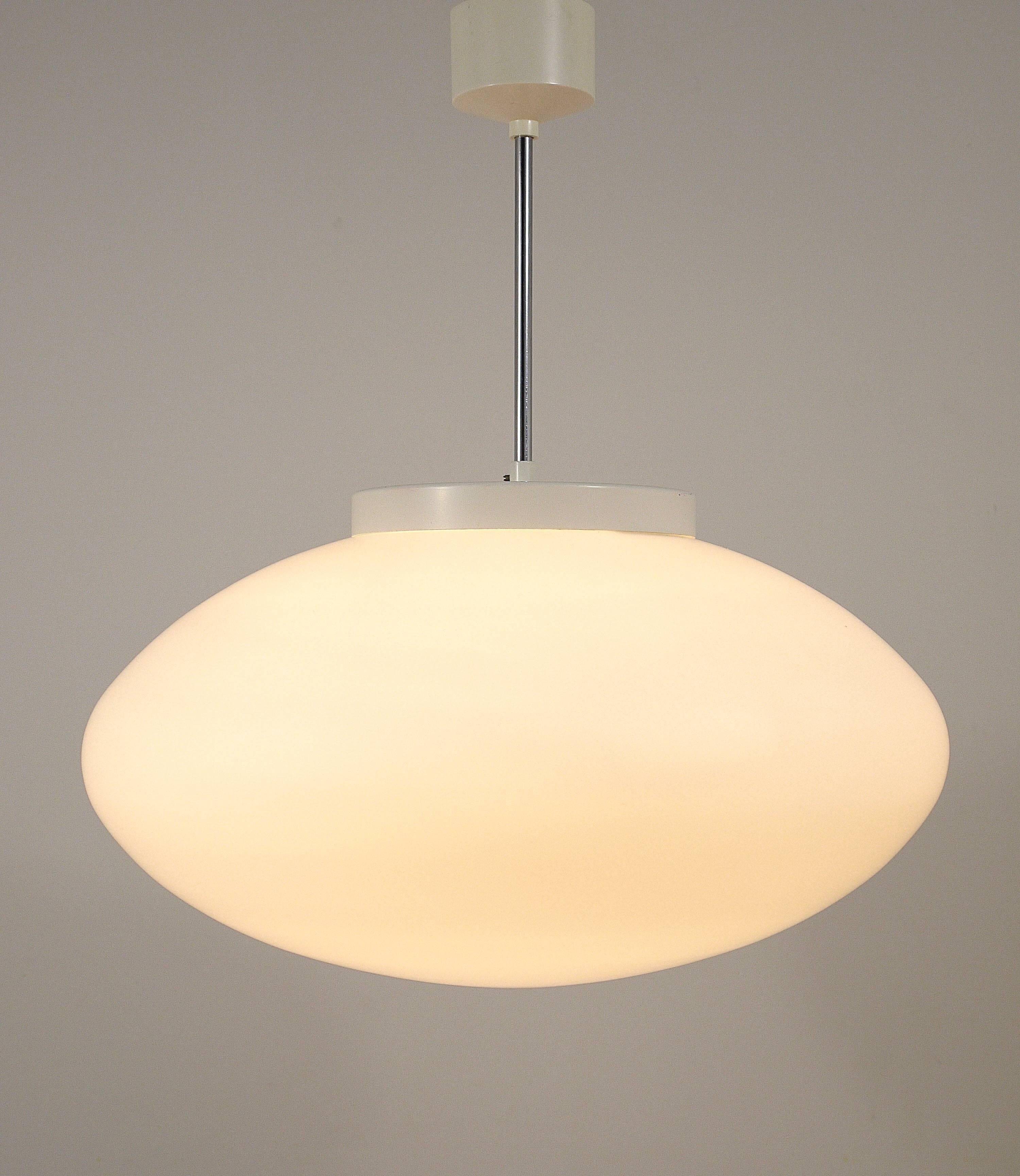 Up to 40 huge elliptical opaline glass pendants, in the style of Lisa Johansson-Pape.