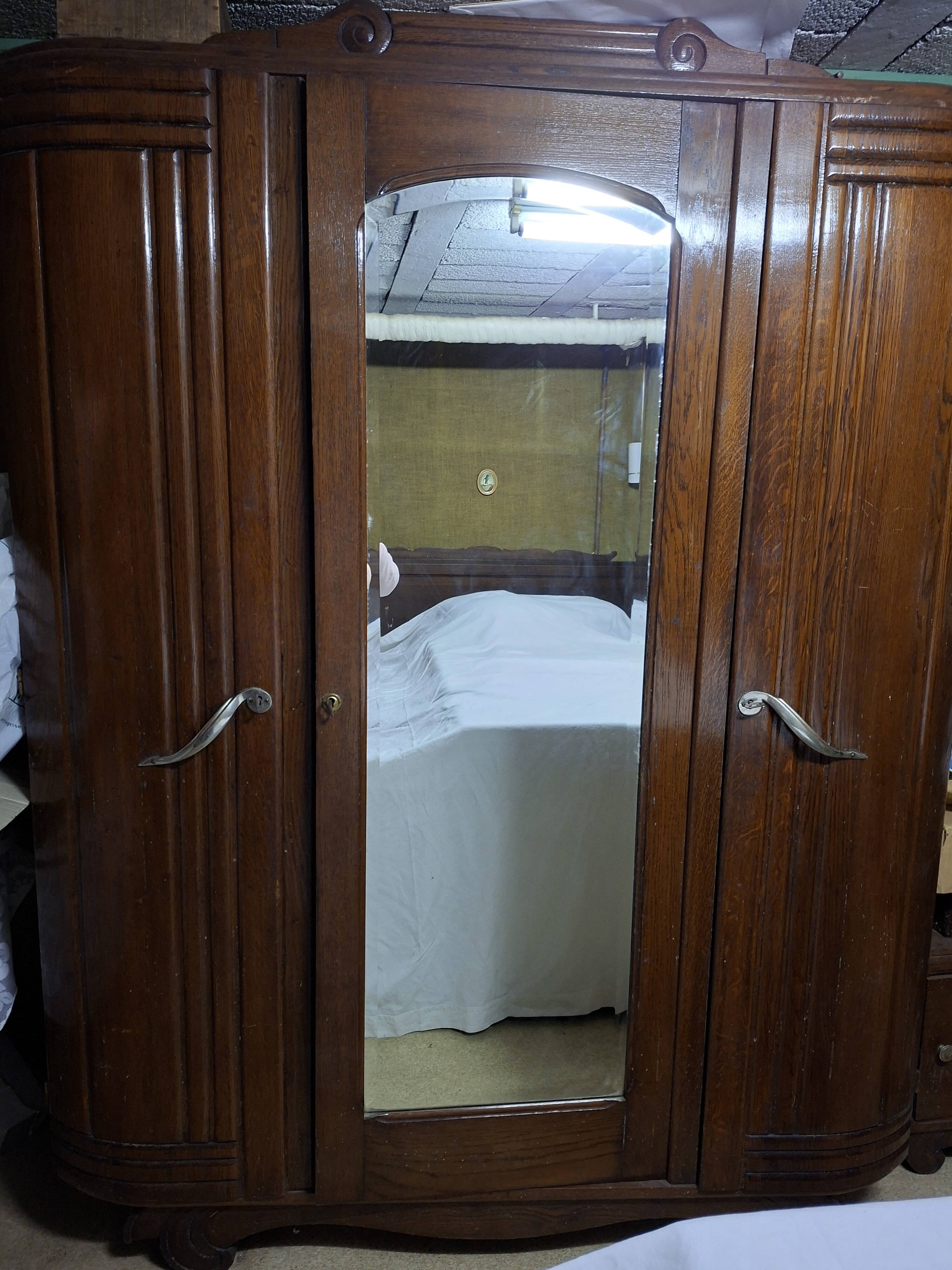 wardrobe with a mirror in the centre