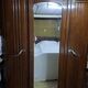wardrobe with a mirror in the centre