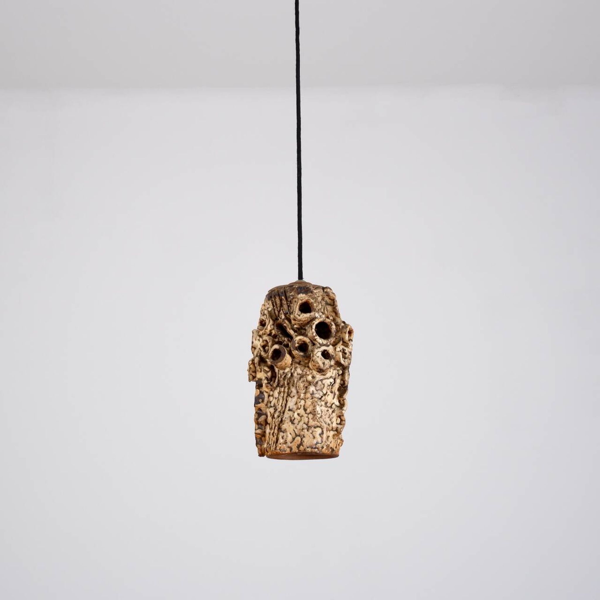 Sculptural ceramic pendant lamps by Bodil Marie Nielsen