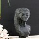 Woman bust in carved stone, 50s