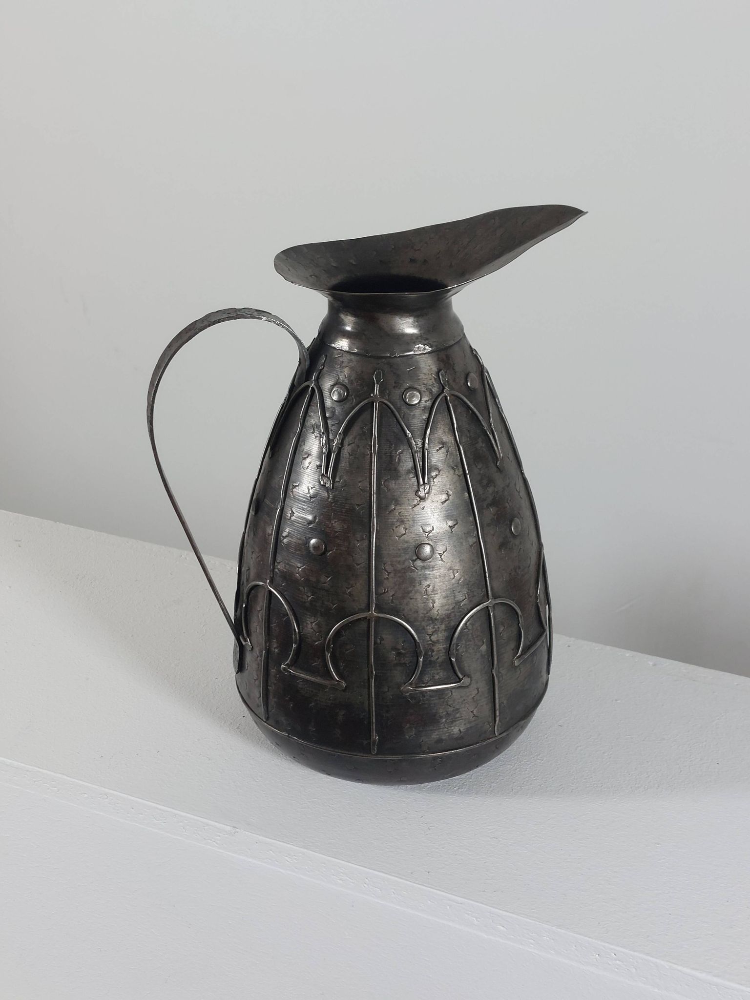 Rare hand-forged metal pitcher and craftsmanship from France.