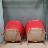 Pair of red leather armchairs