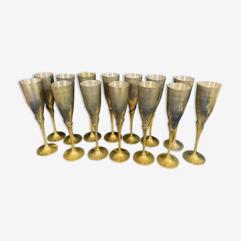 Set of 14 champagne glasses in brass and silver metal