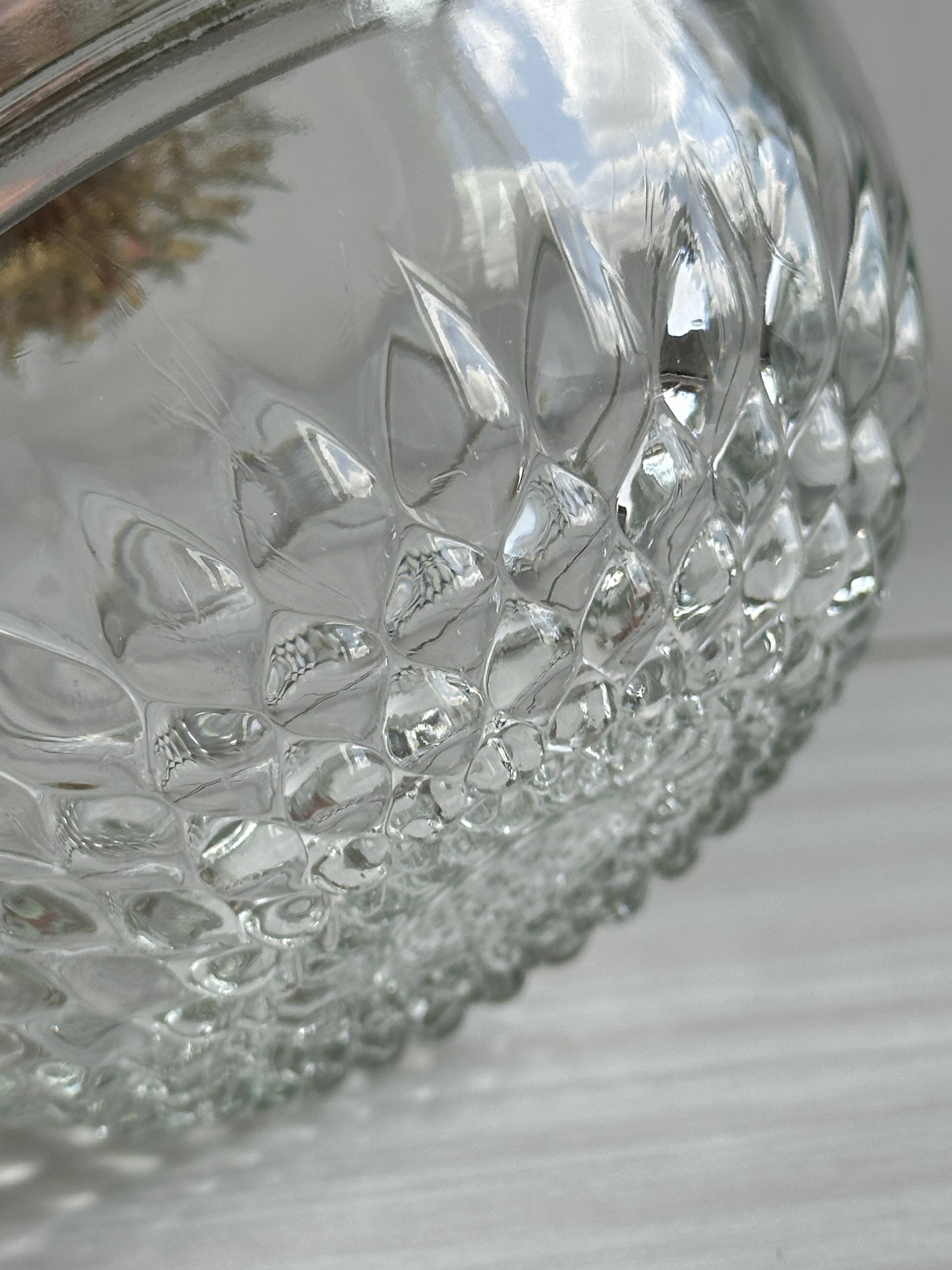 Glass sugar bowl with floral decoration lid