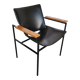 Fauteuil lounge vintage Niko Kralj : cuir skaï noir et accoudoirs en bois