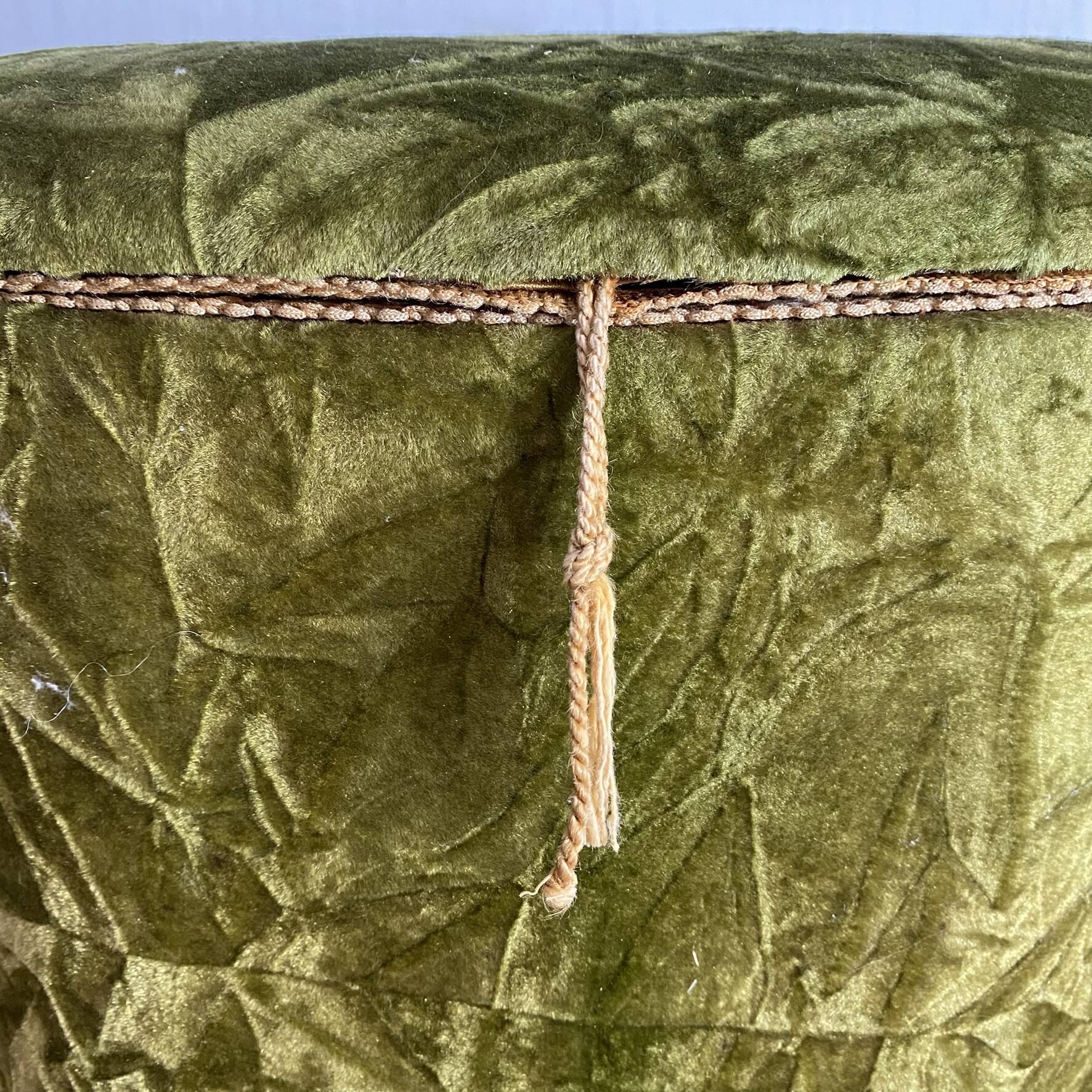 Green velvet storage pouffe from the 1960s.