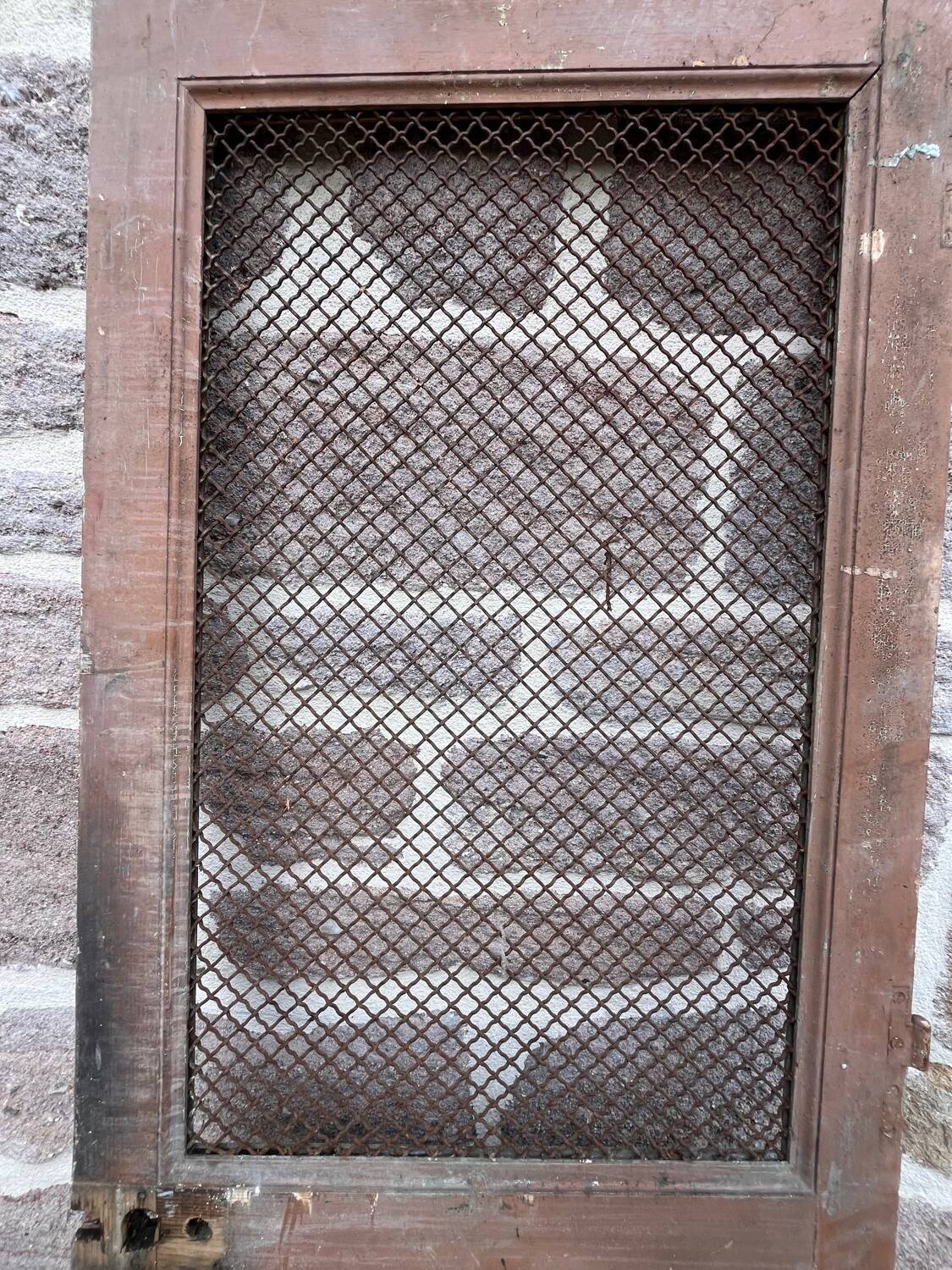 Telephone booth door
