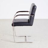 Steel armchair with leather upholstery