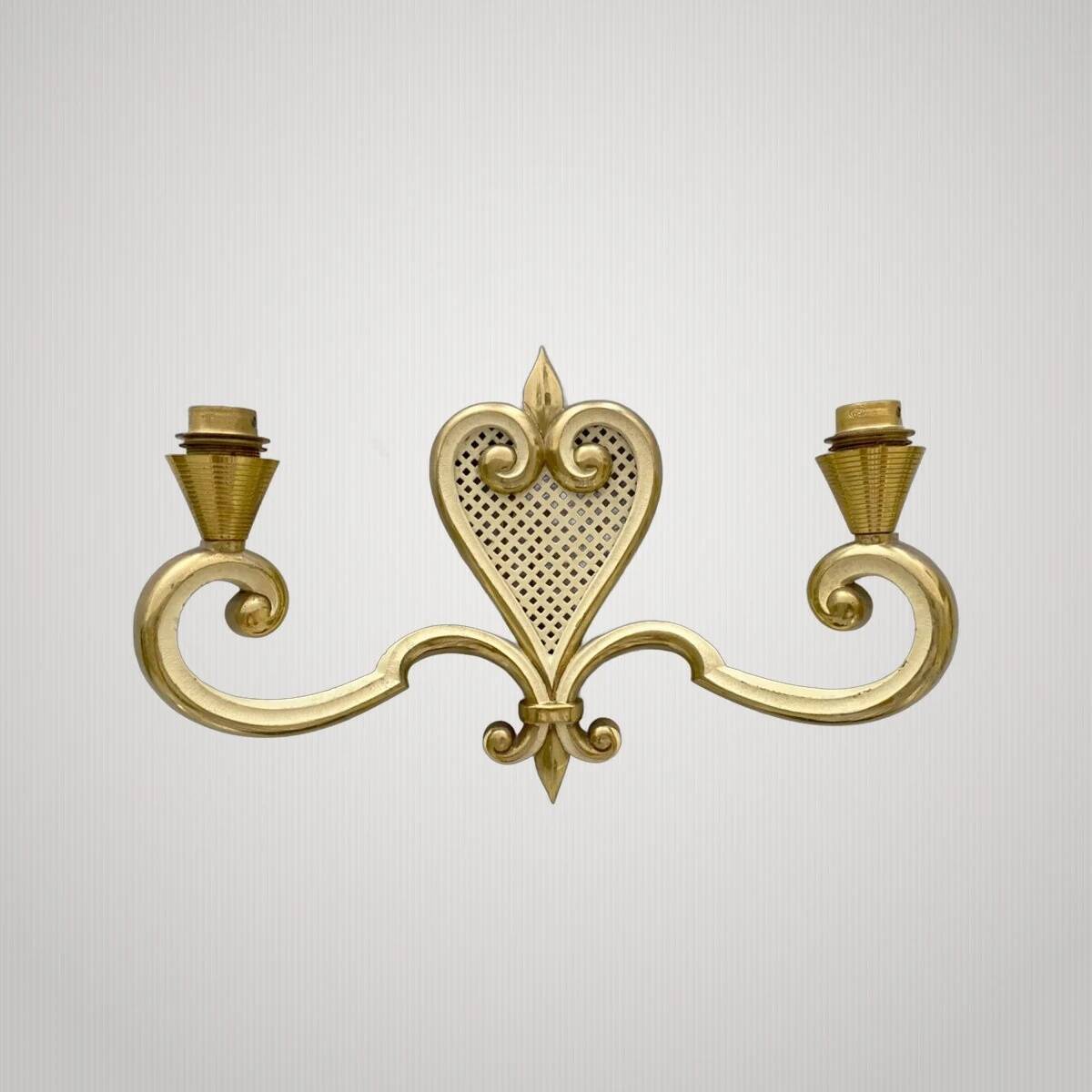 Pair of wall lights from the 1950s by Maison Arlus.