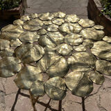 Carved brass coffee table with ginkgo decor