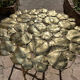 Carved brass coffee table with ginkgo decor