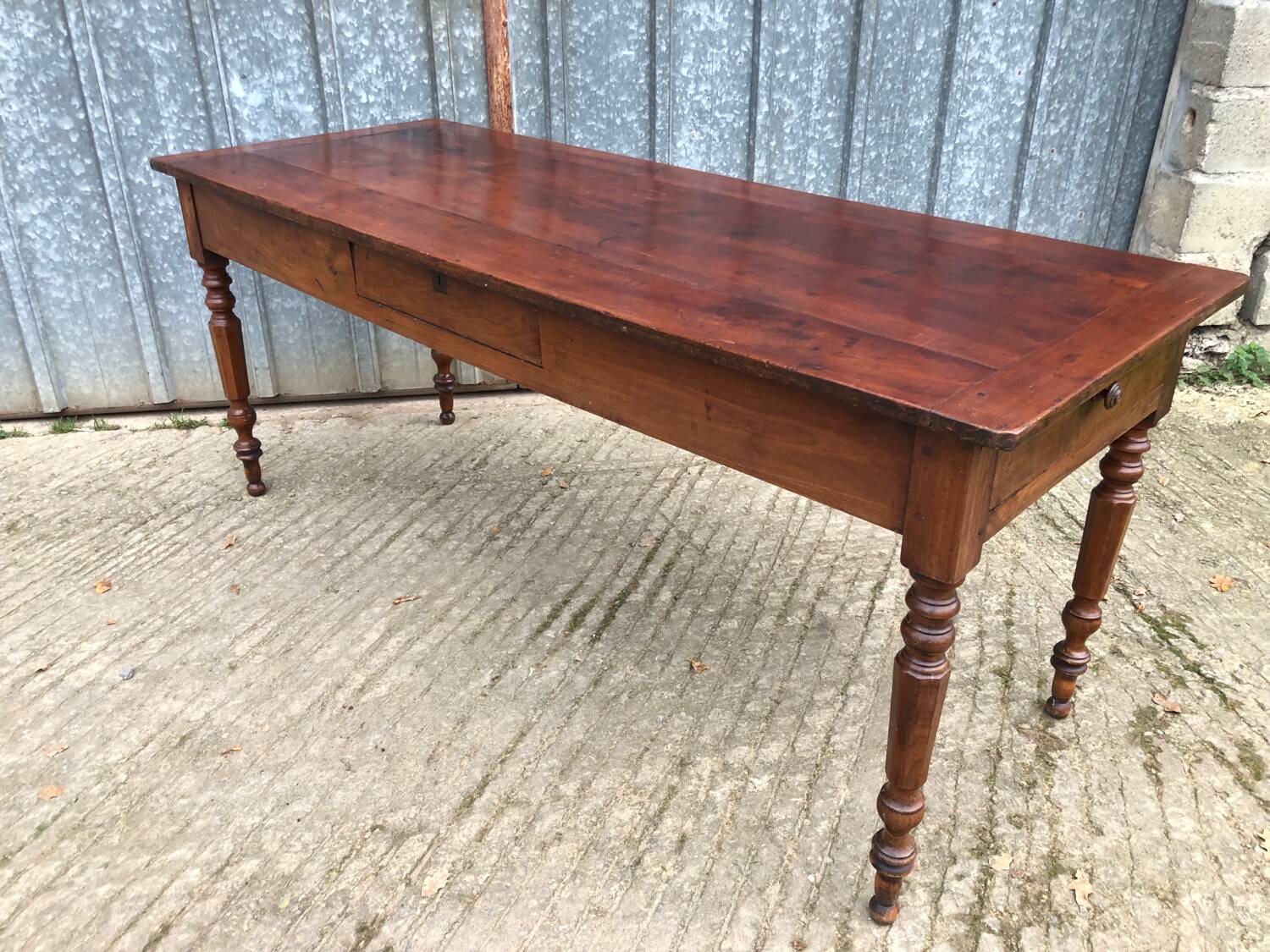 Antique farmhouse table in solid cherry wood with 4 drawers
