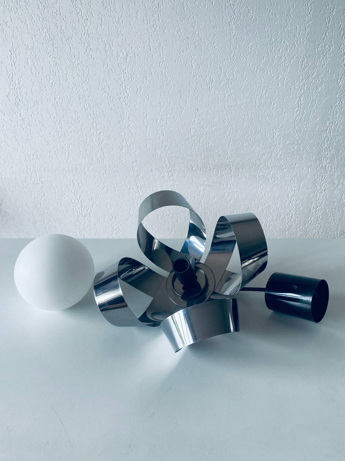 Suspension design chromée